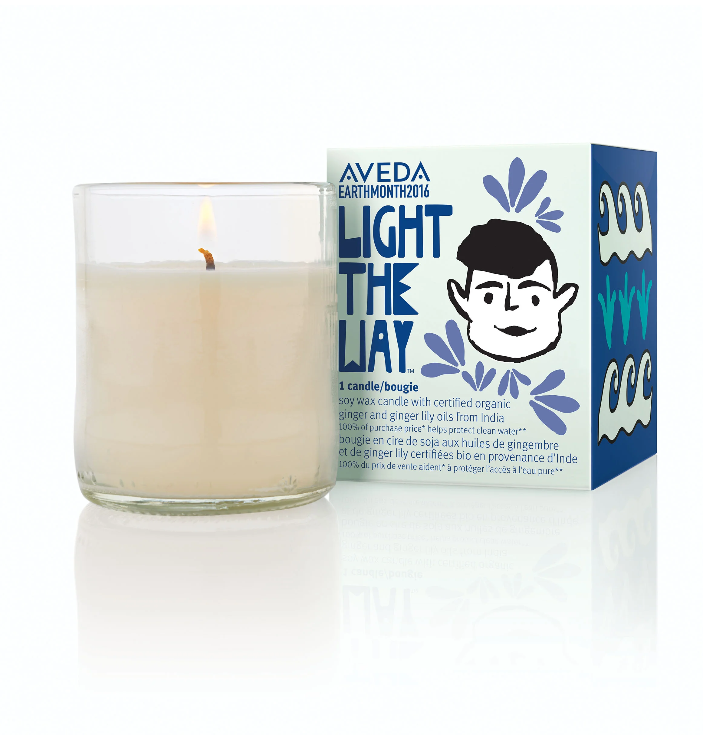 Soy wax candle with certified organic ginger and ginger lily oils from India; 100% of purchase price helps protect clean water
