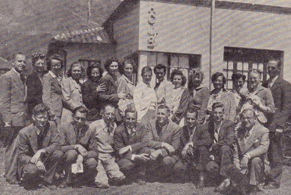 HCJB radio station staff in 1946, including engineer Clayton Howard (front row left), co-founder Clarence Jones (front row right) and future HCJB president Abe Van Der Puy (front row, fourth from left) -- Source: Wikipedia