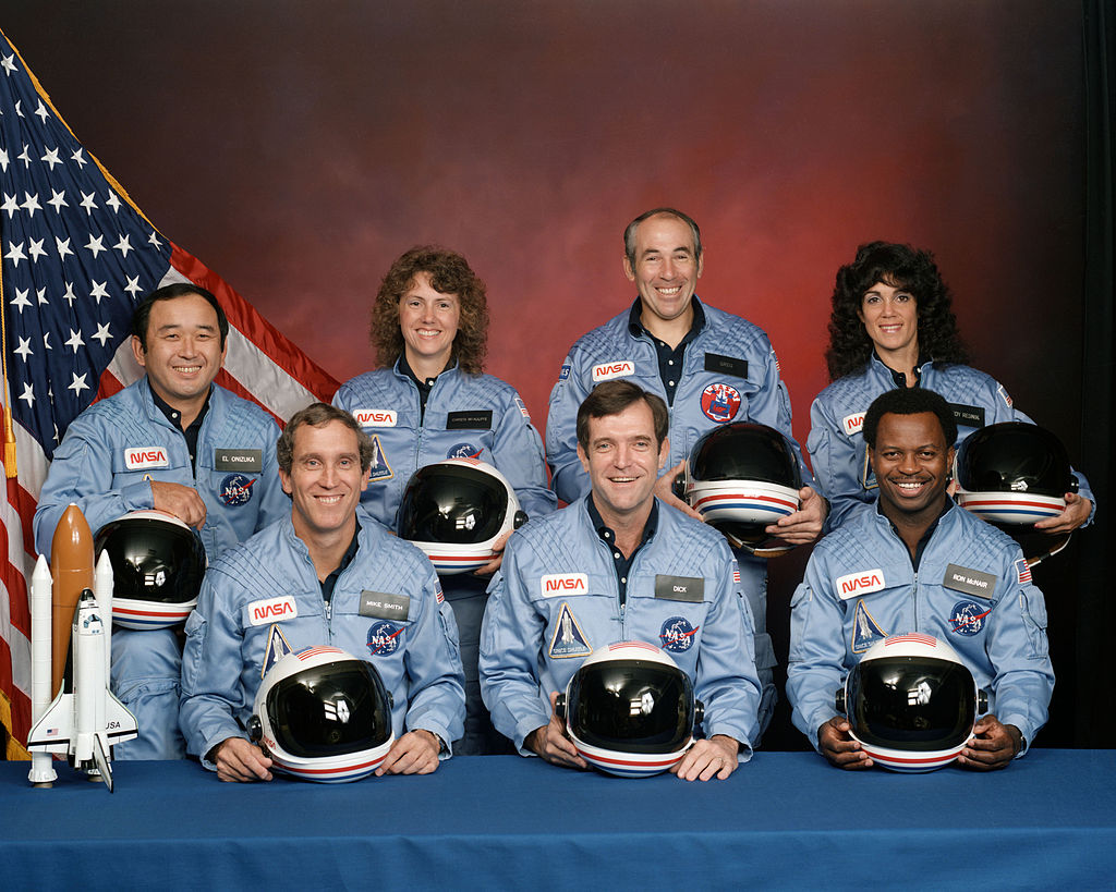 STS-51-L crew: (front row) Michael J. Smith , Dick Scobee , Ronald McNair ; (back row) Ellison Onizuka , Christa McAuliffe , Gregory Jarvis , Judith Resnik .