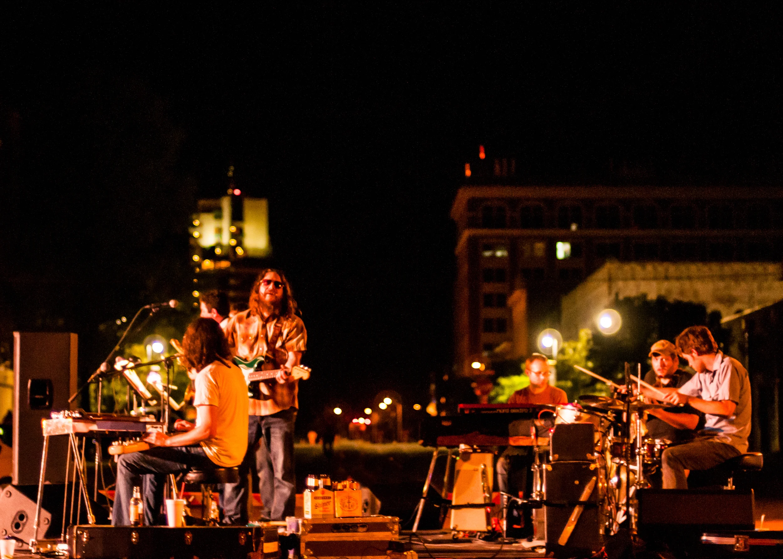 Paul Benjaman Band and Friends tearing up the street! Photo by Tony Lehmer