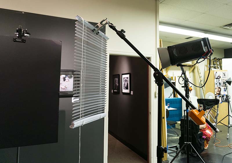 Foam core on a C-Stand, mini blind on a boom arm, and the Elinchrom RX1200