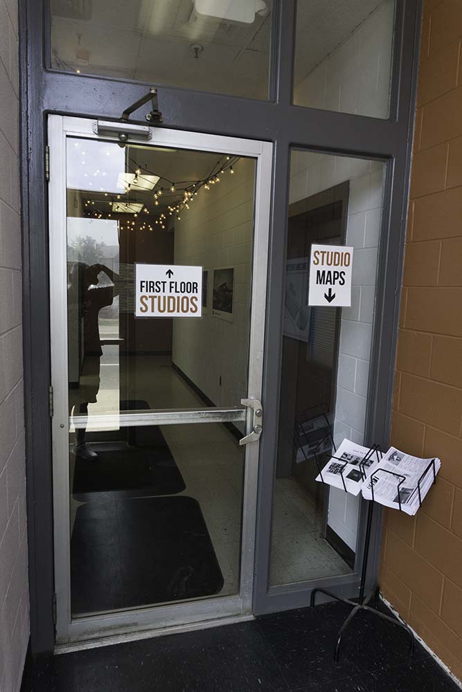 Go through the 2nd glass door and walk back