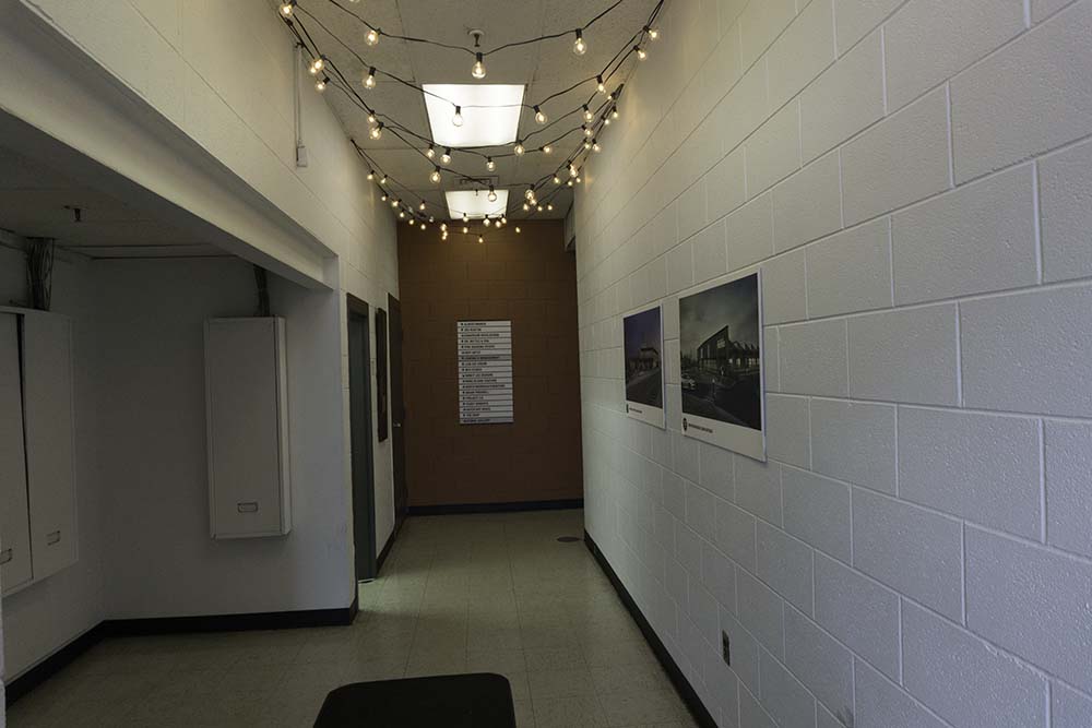 Walk down the hall. The sign board directly ahead lists and points to M10 Studio