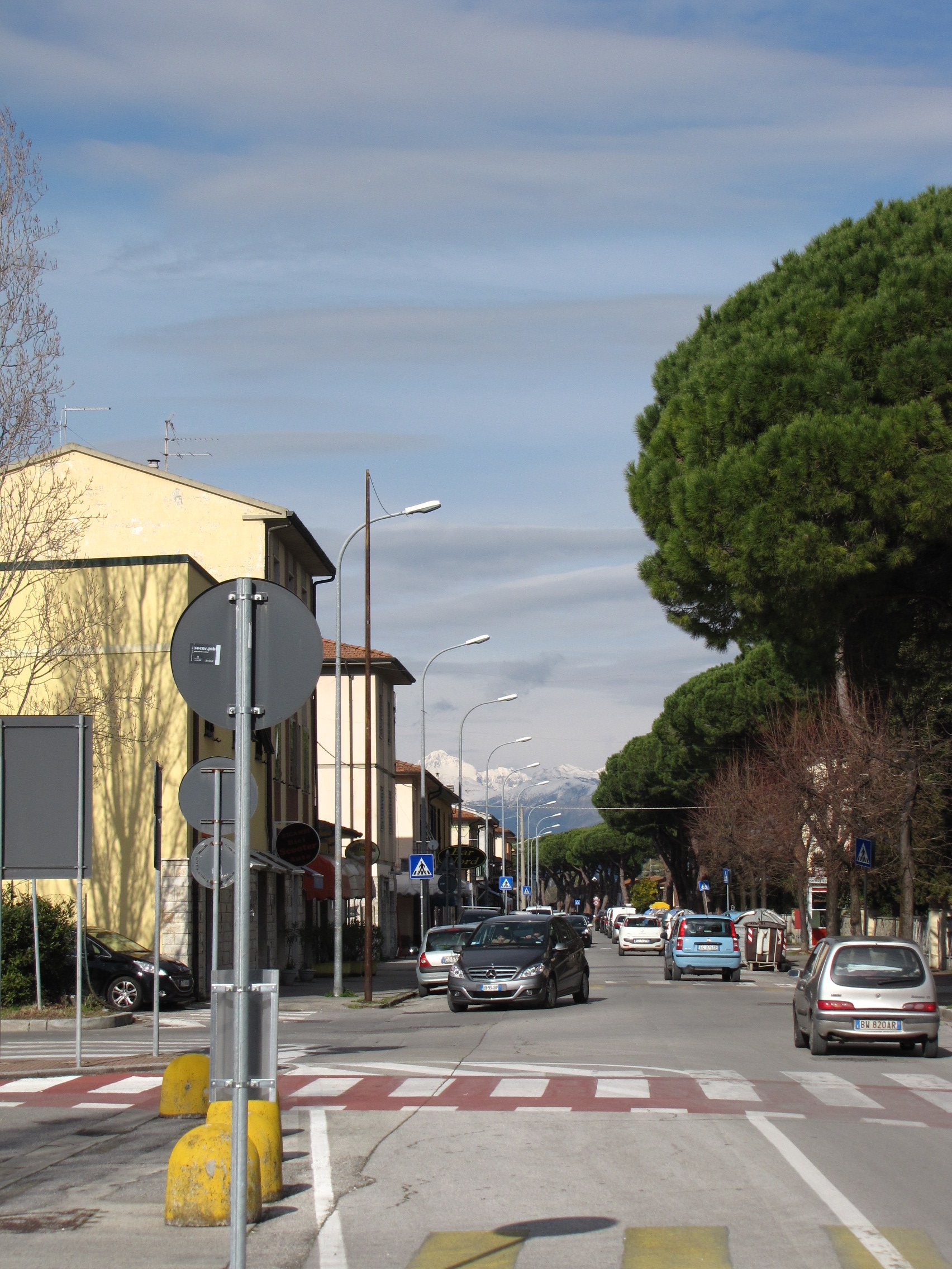This was taken in nearby Pisa. Notice the snow-capped mountains in the background.