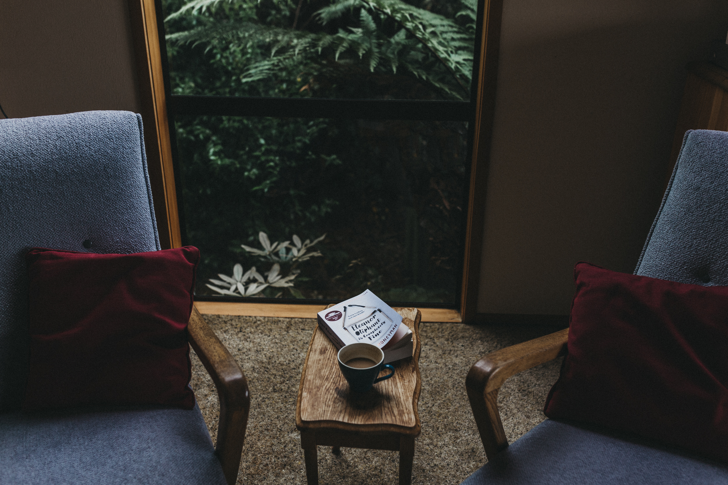 Day Four: coffee and a morning book by the fire while it rains outside.