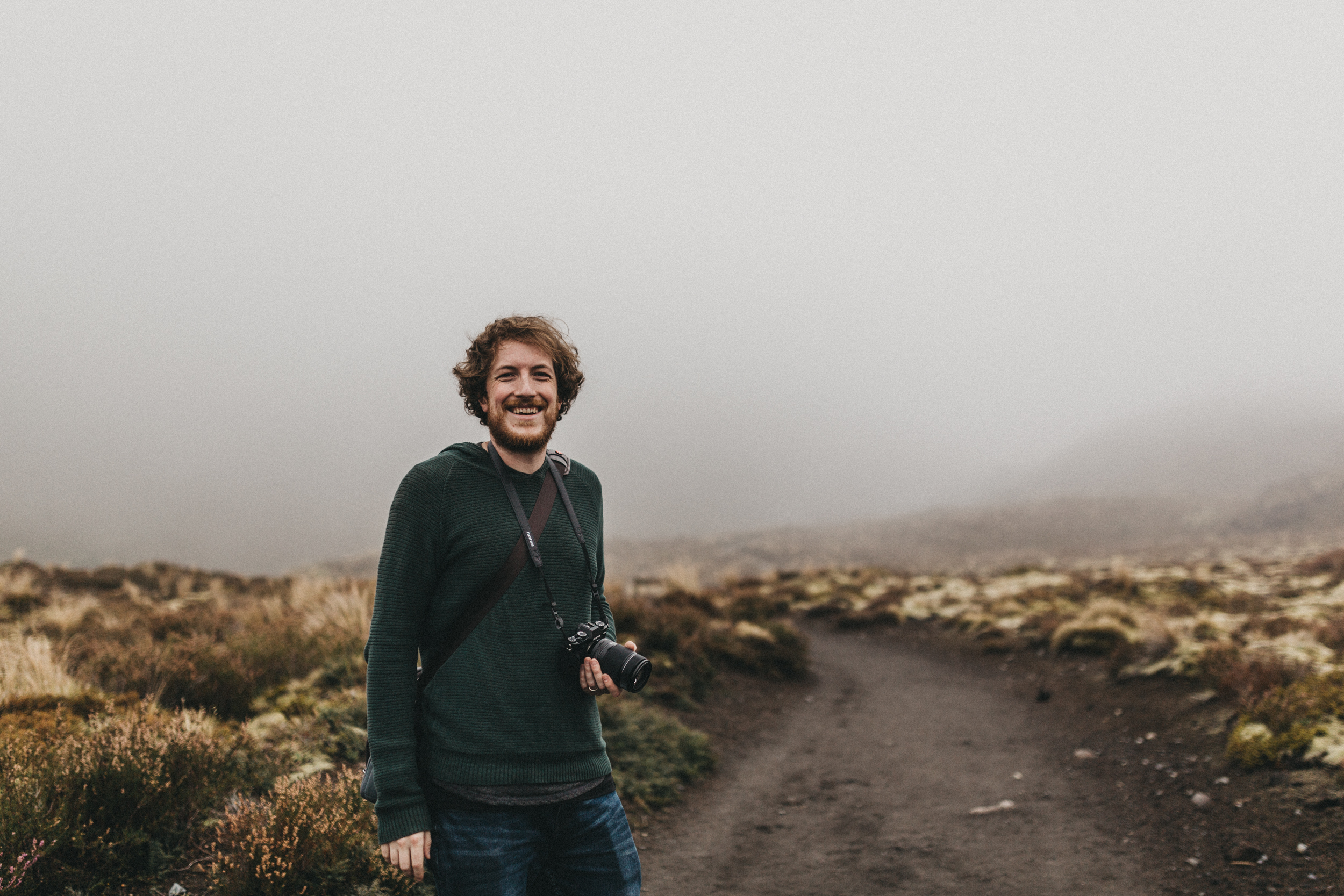 Day Four: Nick laughing about the fact we can't see the huge volcano behind us.