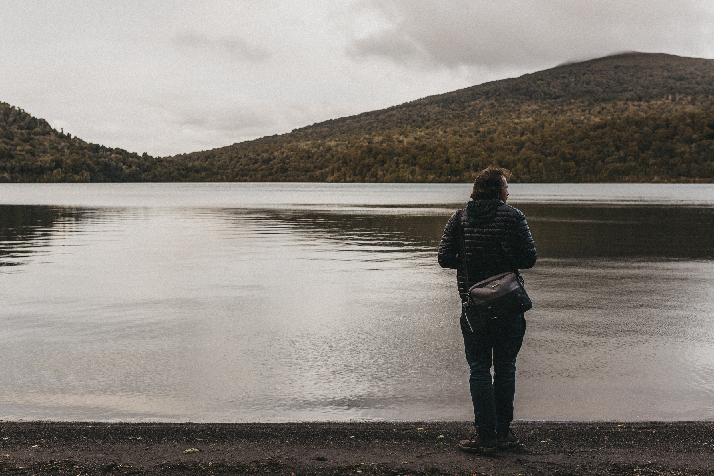 Day One: Nick looking out over Lake Rotopounamu, formed by a landslide 10,000 years ago.