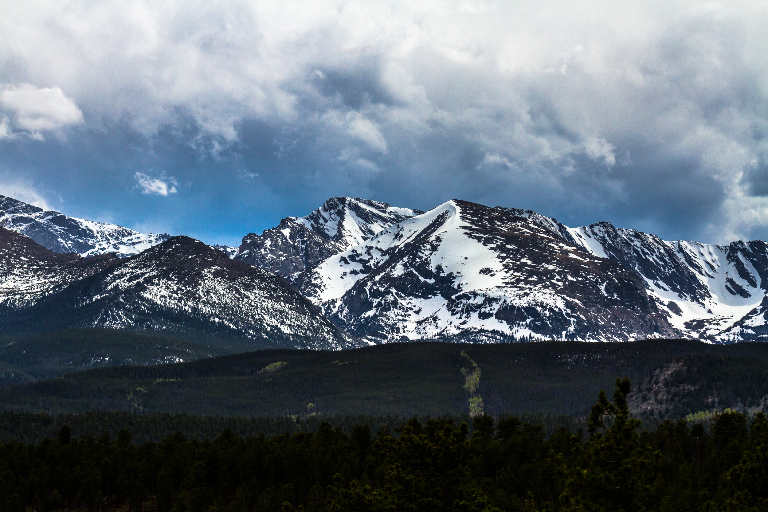 When this world stood still will you be there to feel the immense power? Rocky Mountain National Park, is a hue of violence always changing from the Earth's strong will to move forward