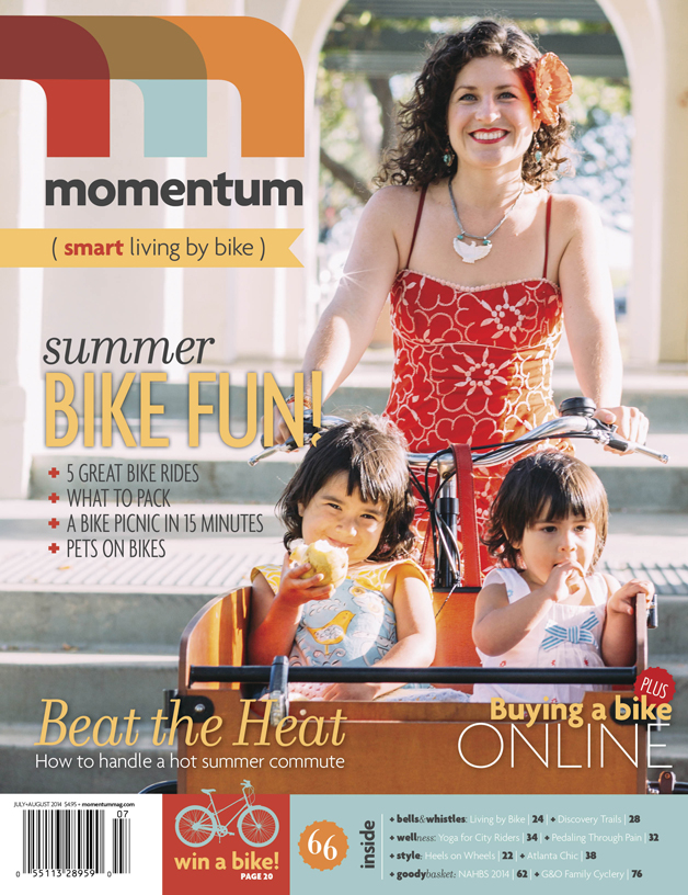 Single Mom marketing guru Shelby Sanchez of Dream Inspired Design of Long Beach with her two daughters in their beloved cargo bike are the cover story for Momentum Magazine for July/August. Image by Lisa Beth Anderson .