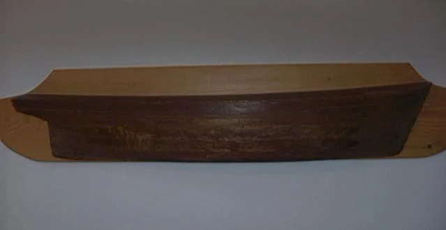 Shipbuilders half model of the ship P.I. Nevis built at the Bennett shipyards in Hopewell Cape in 1858. A half model is similar to architectural drawings of today. The half model is a scale model of the real ship’s hull, and was used in the design and building of the ship.