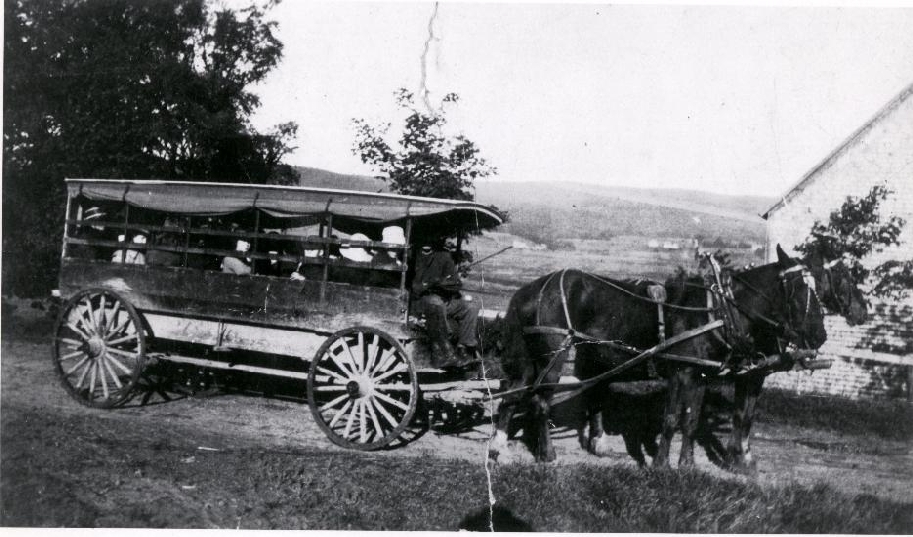  Horse powered van was used to transport students to the Riverside Consolidated School in the summer.   1905  