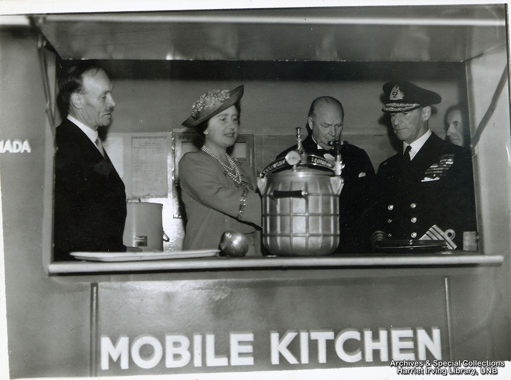  R.B. Bennett with Queen Elizabeth in a mobile kitchen Circa 1942 England 