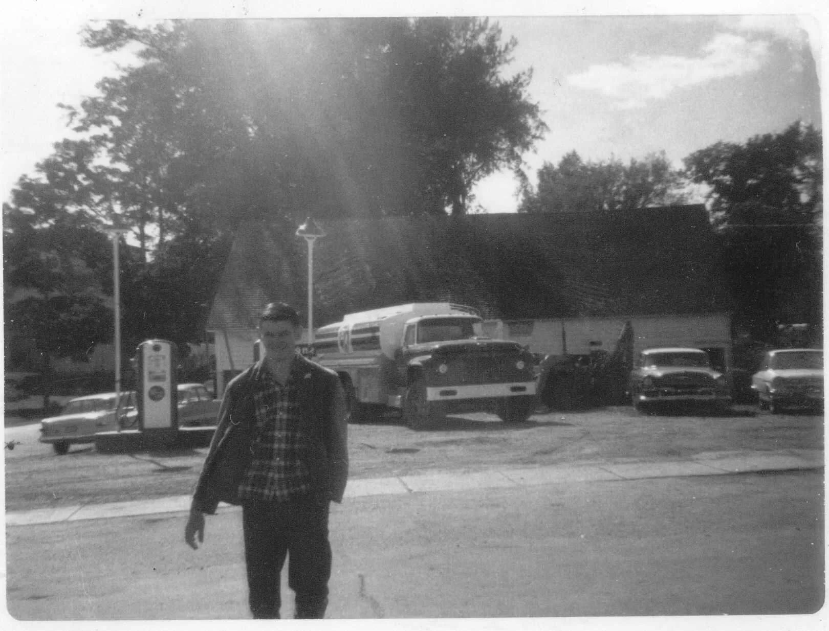 Snider’s Garage, Hillsborough, NB taken in the early 1970’s. The man is Terry Fenton.