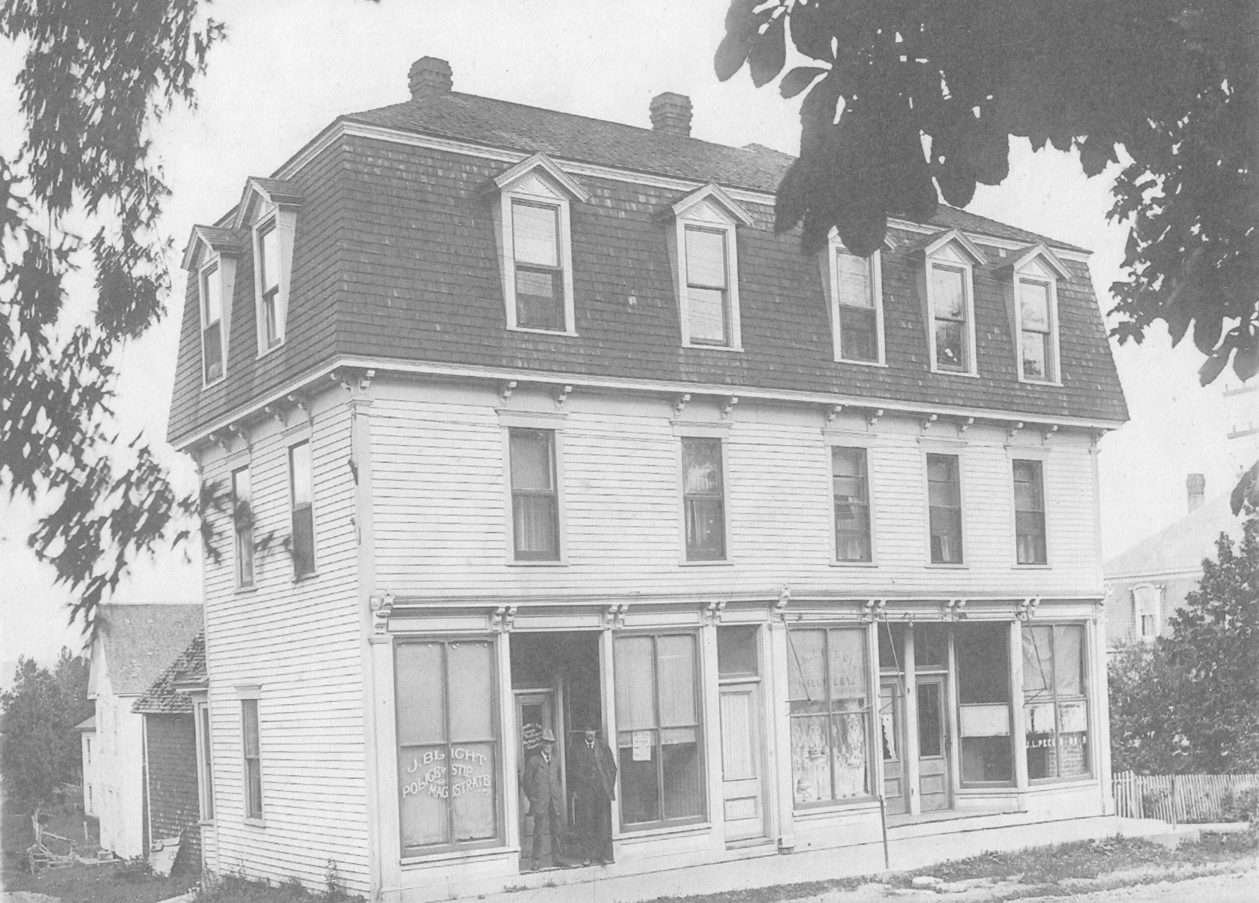 J.L.Peck Bank Building on Corner of Mill Street and Main Street in Hillsborough.Taken in the 1920’s.building Burned in 1947 From Vaughn Snider Collection