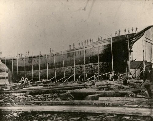 The Revolving Light while under construction at the Turner Shipyards in Harvey in 1875. The ship was the first square rigged all masts built at Harvey. The ship weighed 1248 tons and was named for Cape Spencer Light, Saint John. From the Albert Coun…