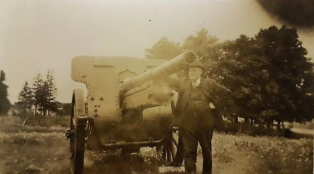 In the photo is Sheriff Ernest W. Lynds, and you can prominently see the plaque on the top left of the cannon stating how the cannon arrived in Albert County. From the Albert County Museum Collection.