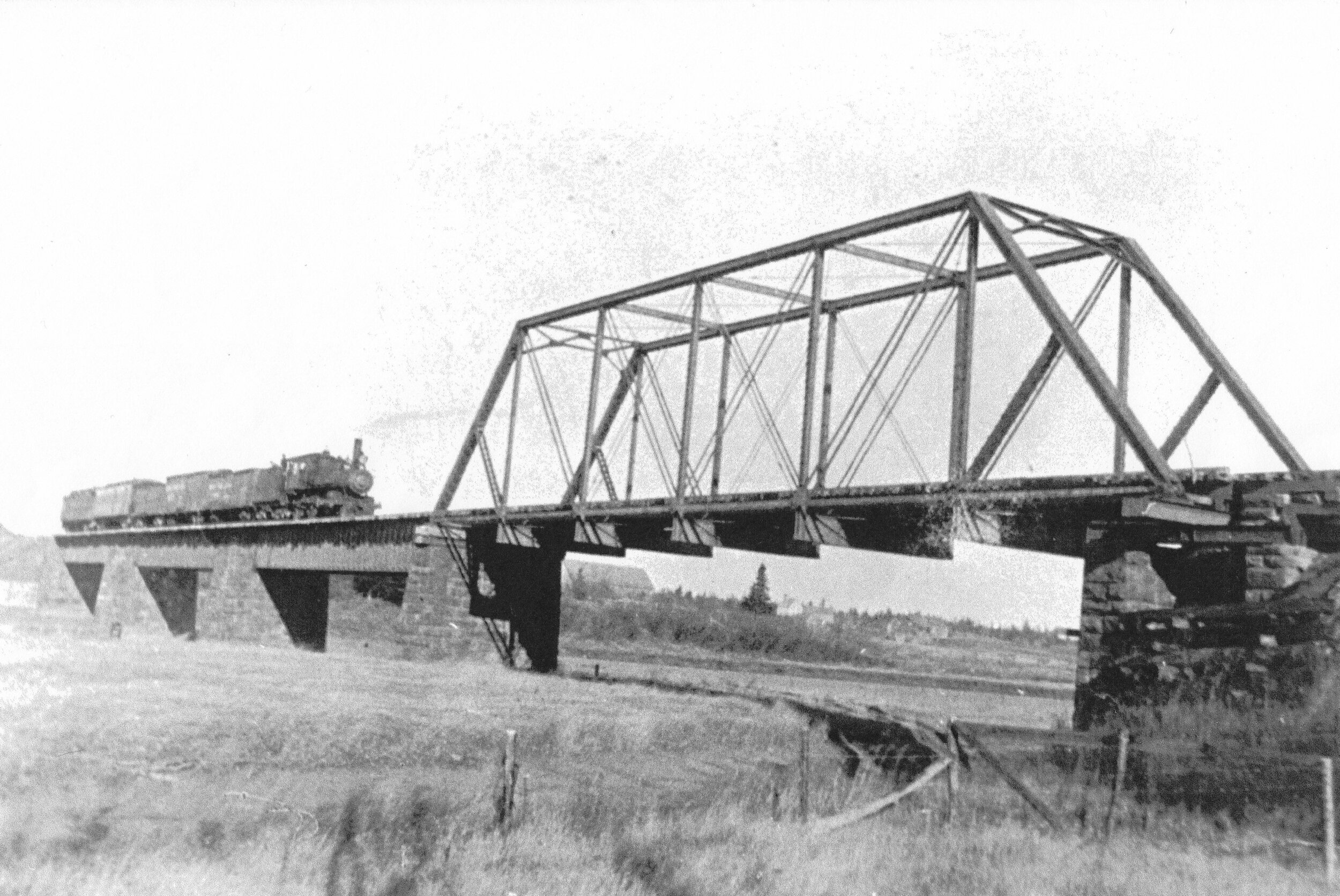 Salisbury and Albert Locomotive #5 crossing the Petitcodiac River at Salisbury. This bridge was taken by ice March 1912. From Vaughn Snider Collection