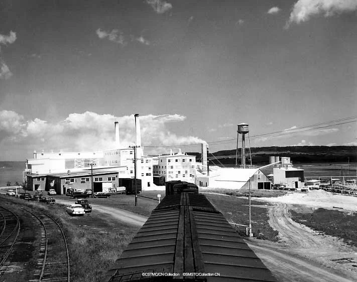 Locomotive leaving the plaster and plaster board manufacturing plant of the Canadian Gypsum Company ca. 1956 Image No.: CN005073 . From the Museum of Industry and Mining, Ottawa