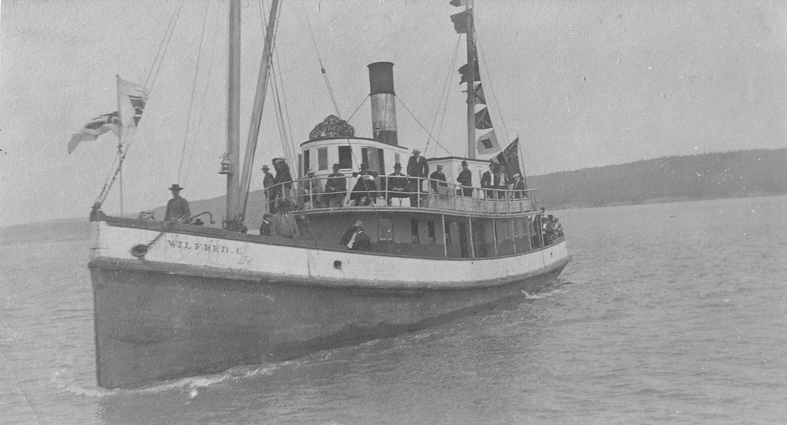 the “Wilfred C” in the River. circa 1910. From the Albert County Museum collection 998.7.2.