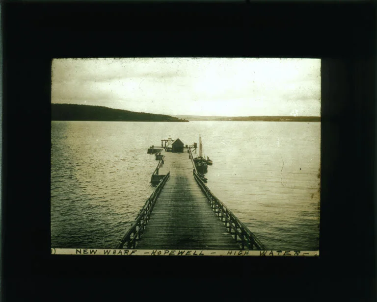 Wallace Rupert Turnbull,  New Wharf at High Water, Hopewell, New Brunswick  c. 1919. From the New Brunswick Museum, Wallace Rupert Turnbull fonds Turnbull-237