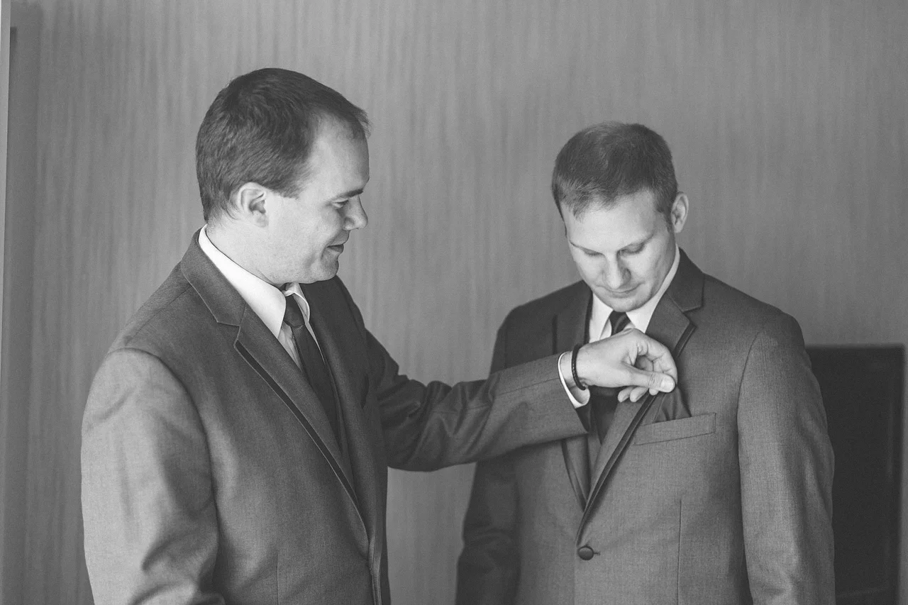 Best Man Adjusts Pocket Square