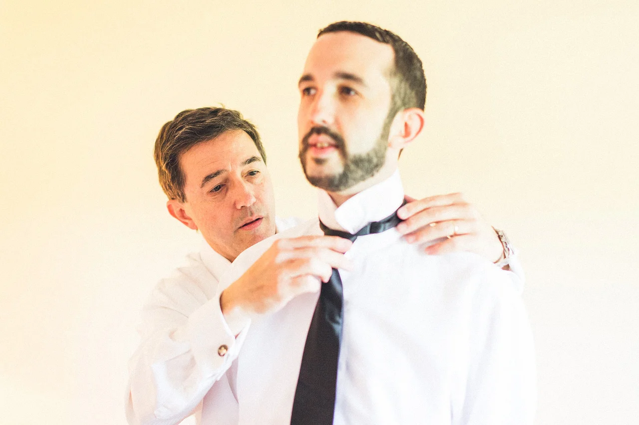 Groom and Father fixes tie