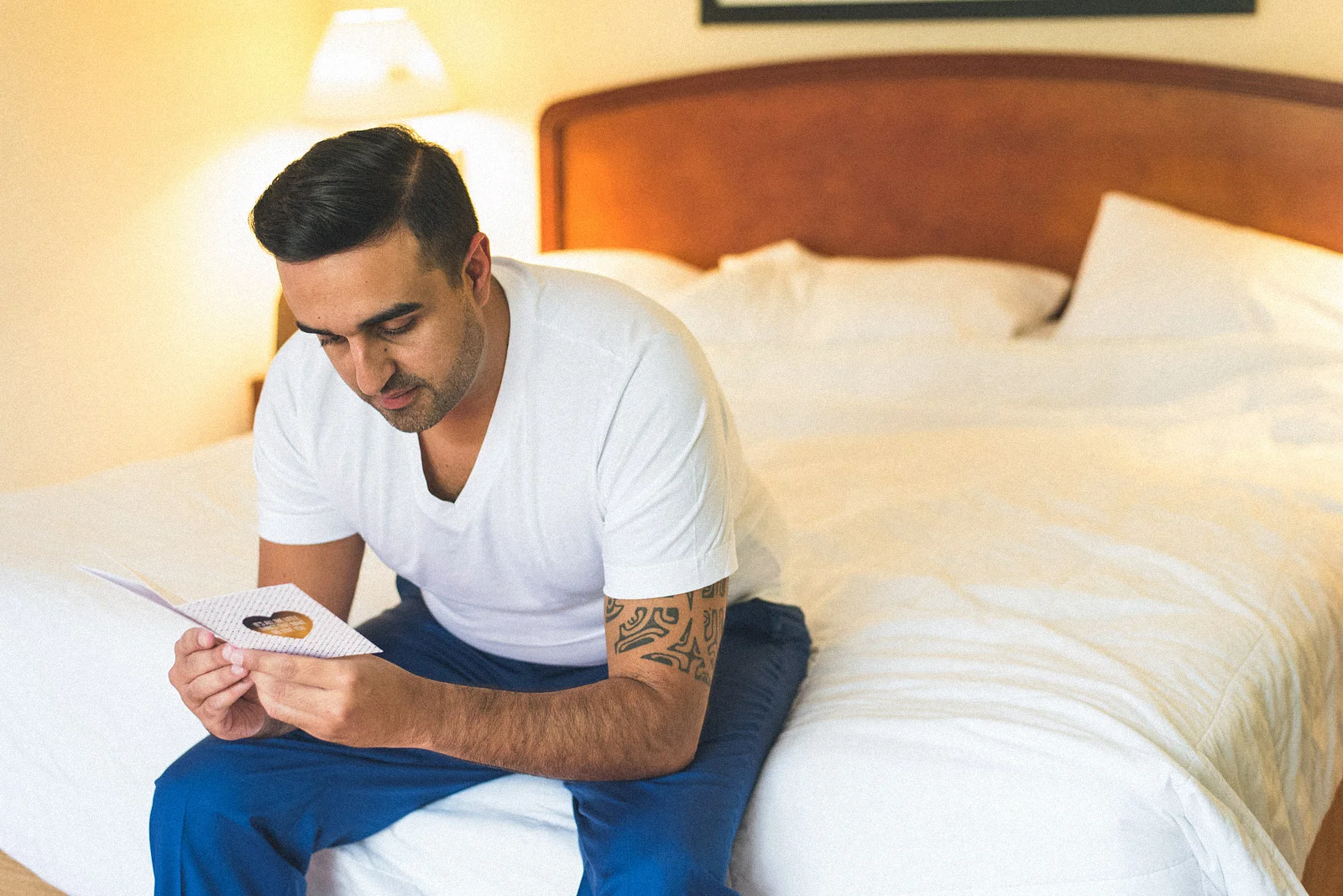 Groom reads card from Bride