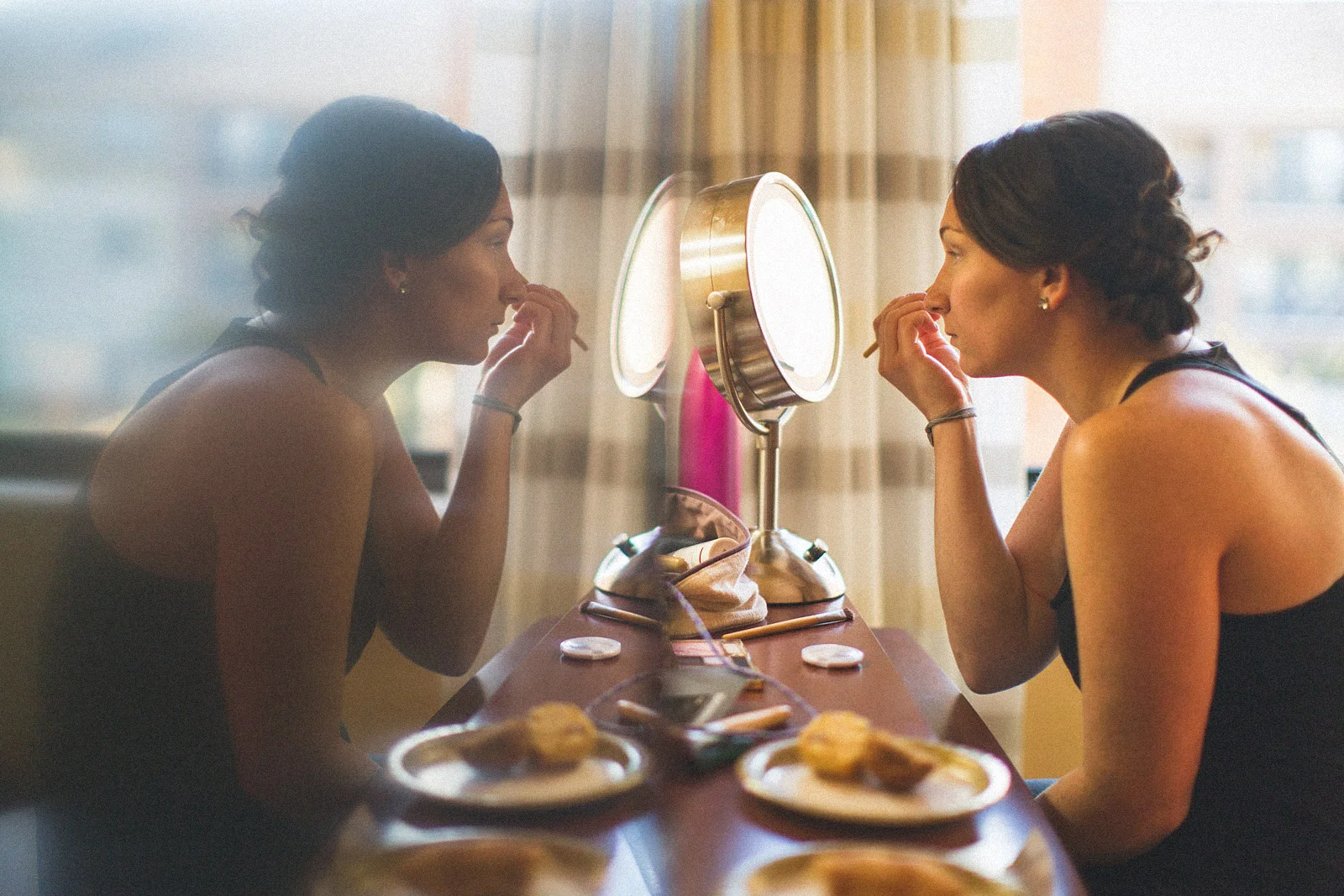 Bridesmaid does her makeup