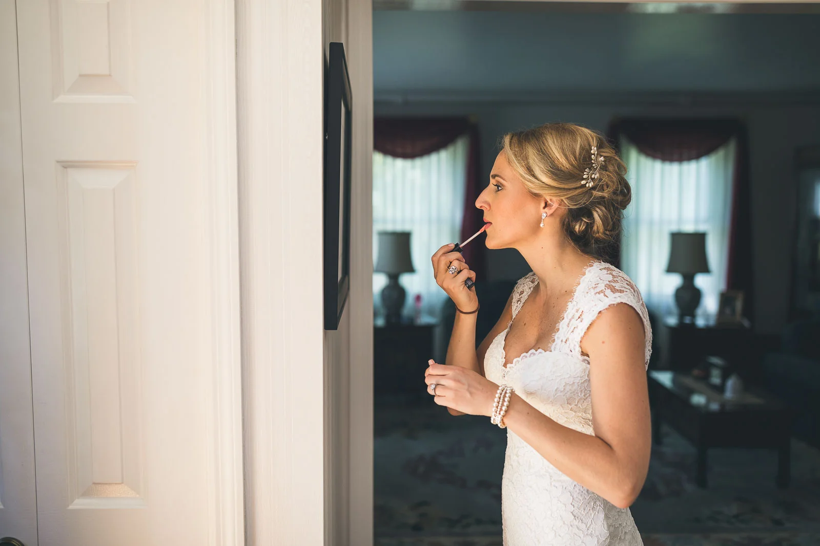 Bride applies finishing touches
