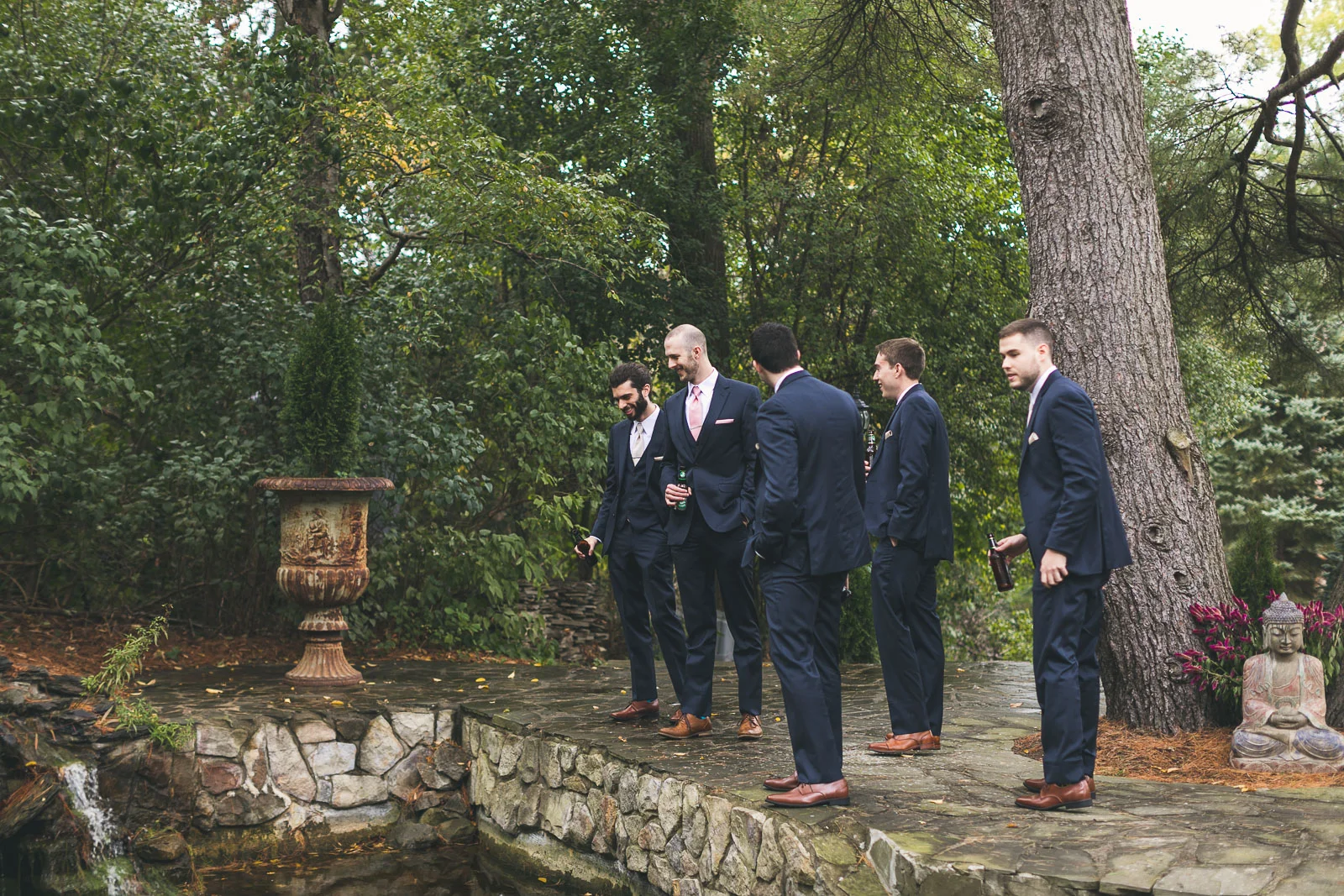 Groom admires pond