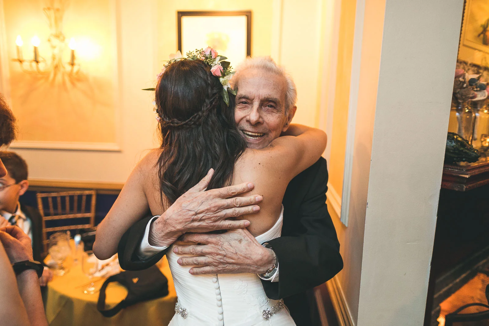 Grandfather hugs Granddaughter