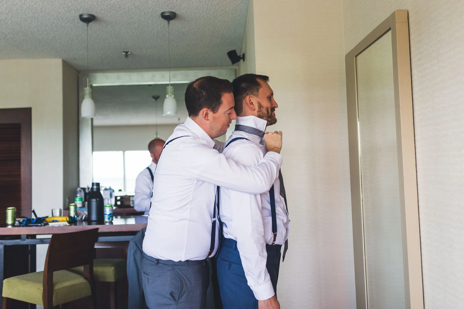 Groom gets help with his tie