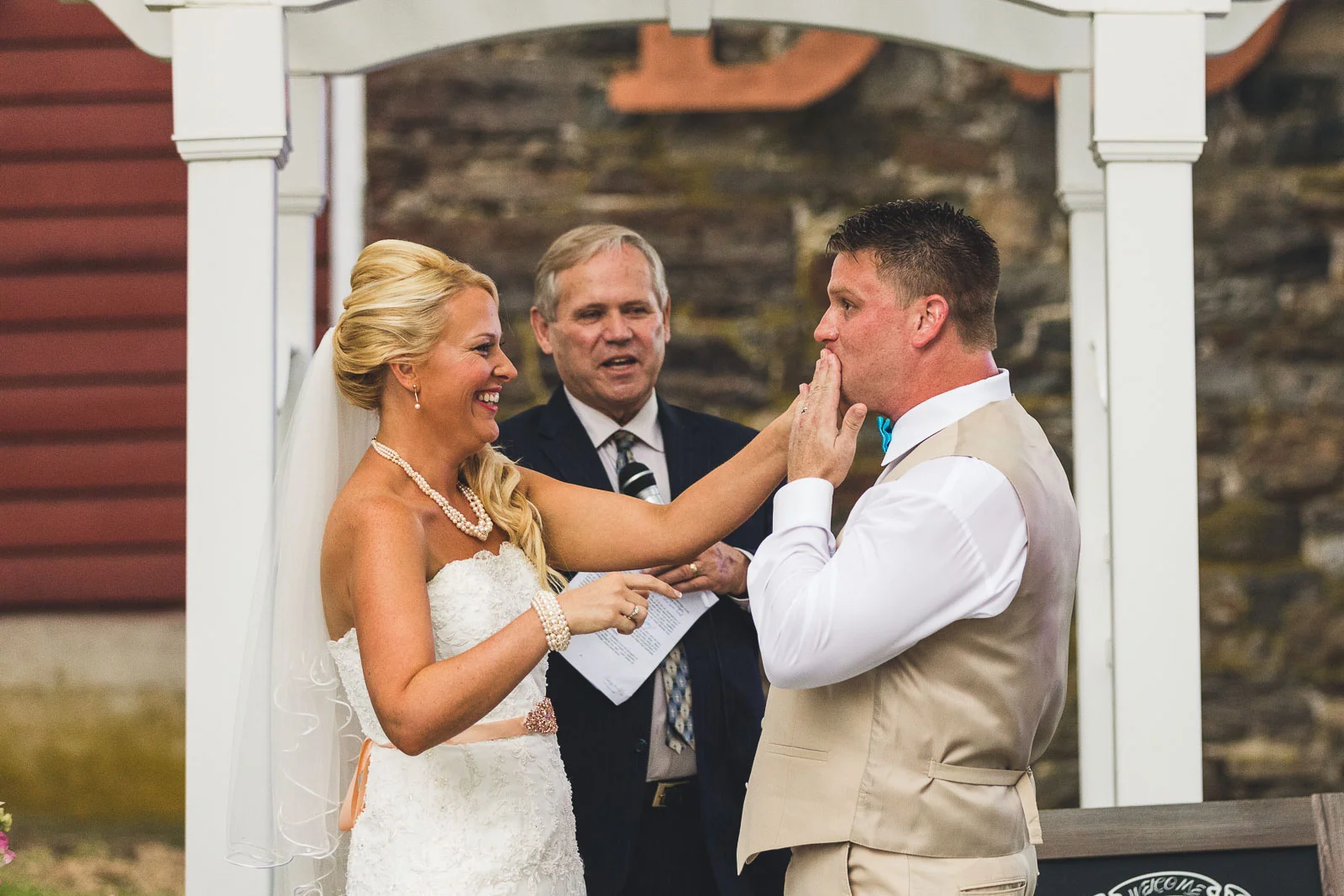 Bride wipes makeup off groom