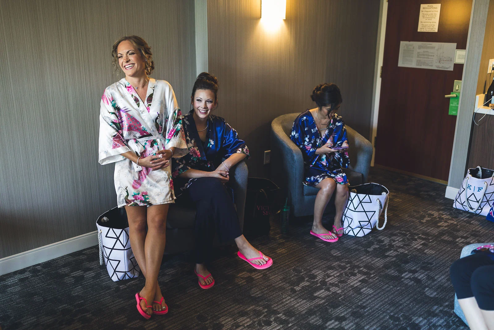 Bride waits to get dress on