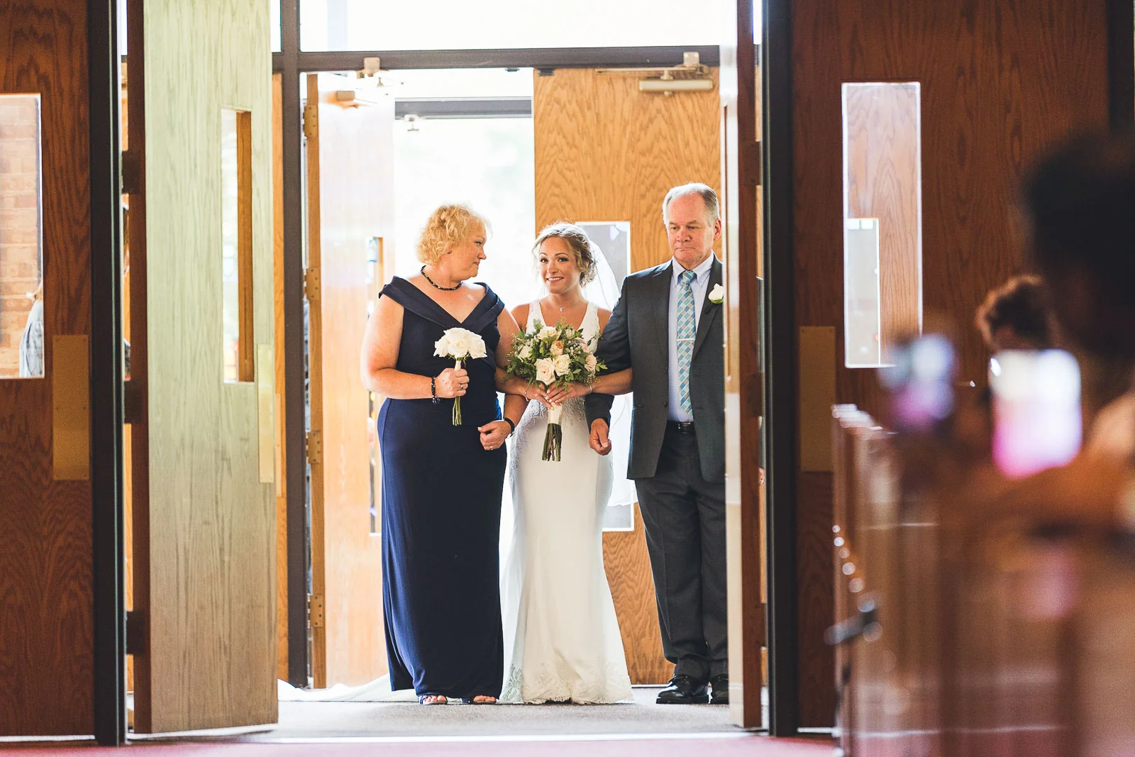 Parents walk bride down aisle