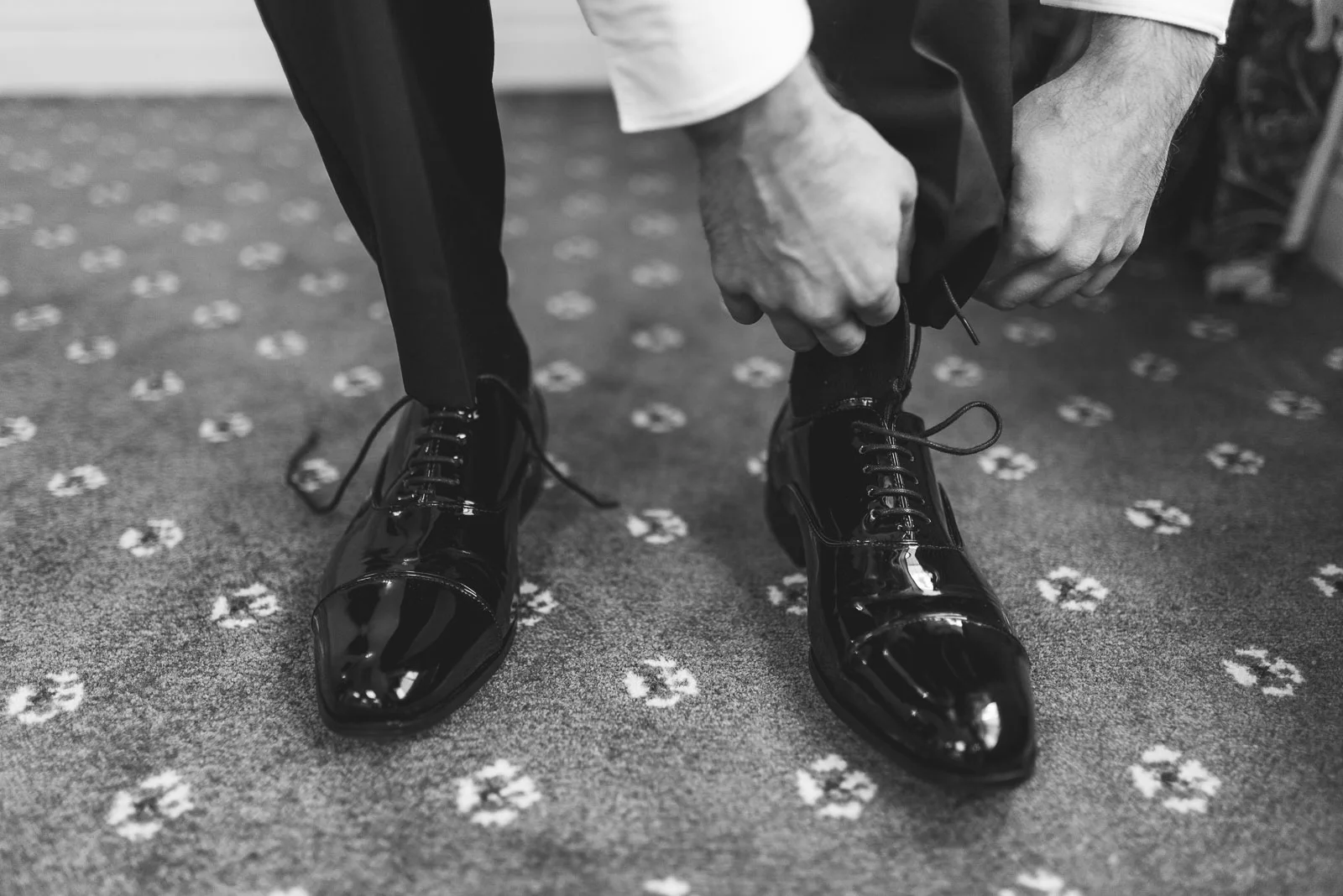 Groom ties shoes