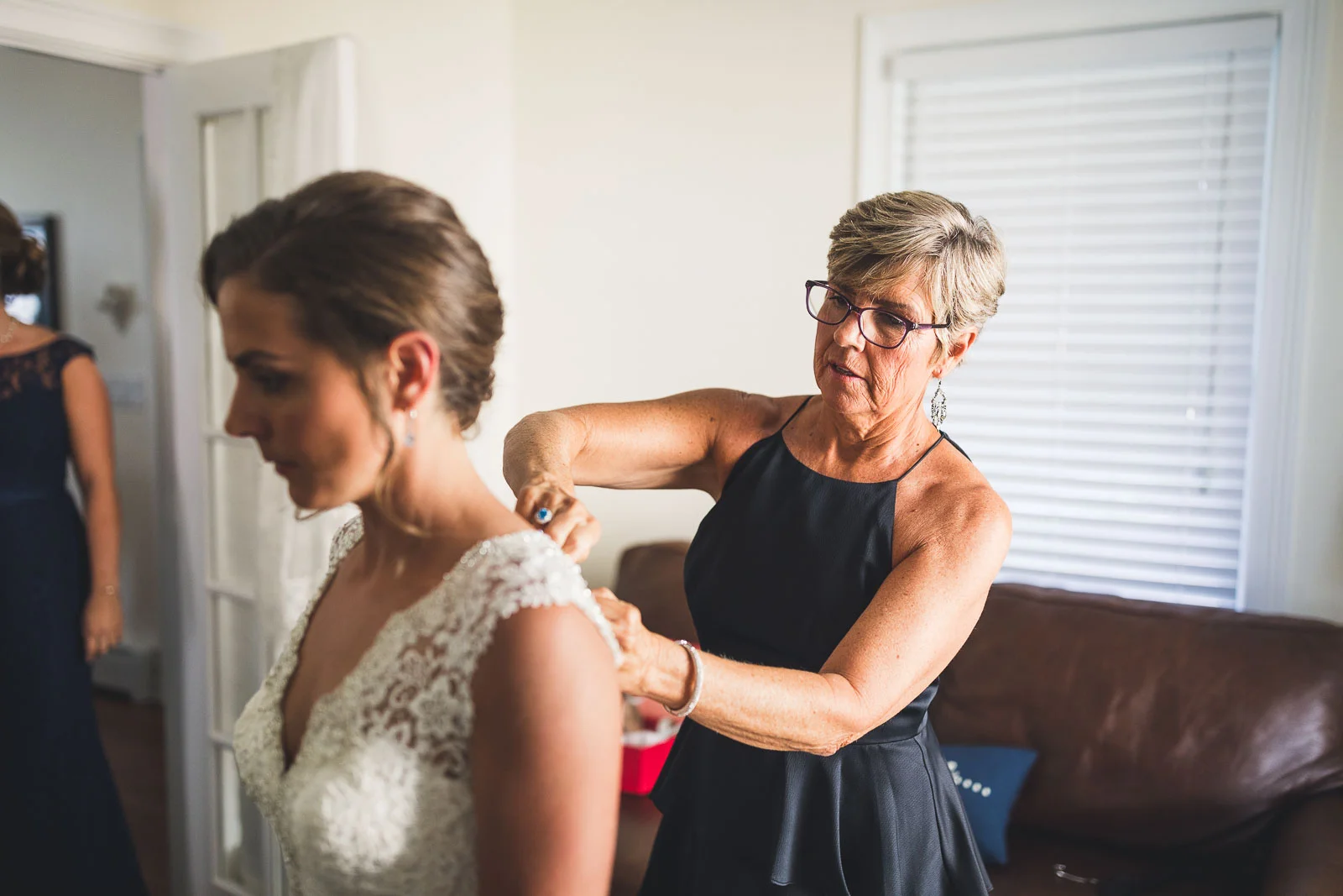 Mom helping with dress