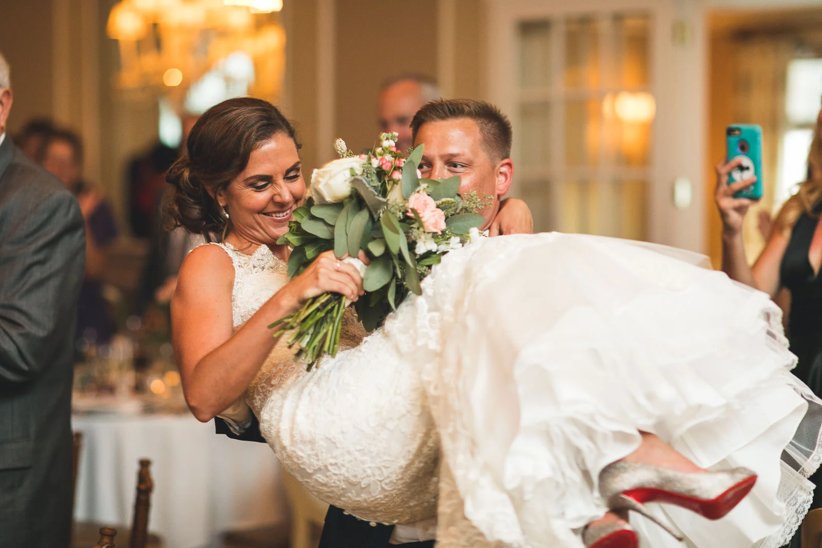 Carrying your wife into the reception