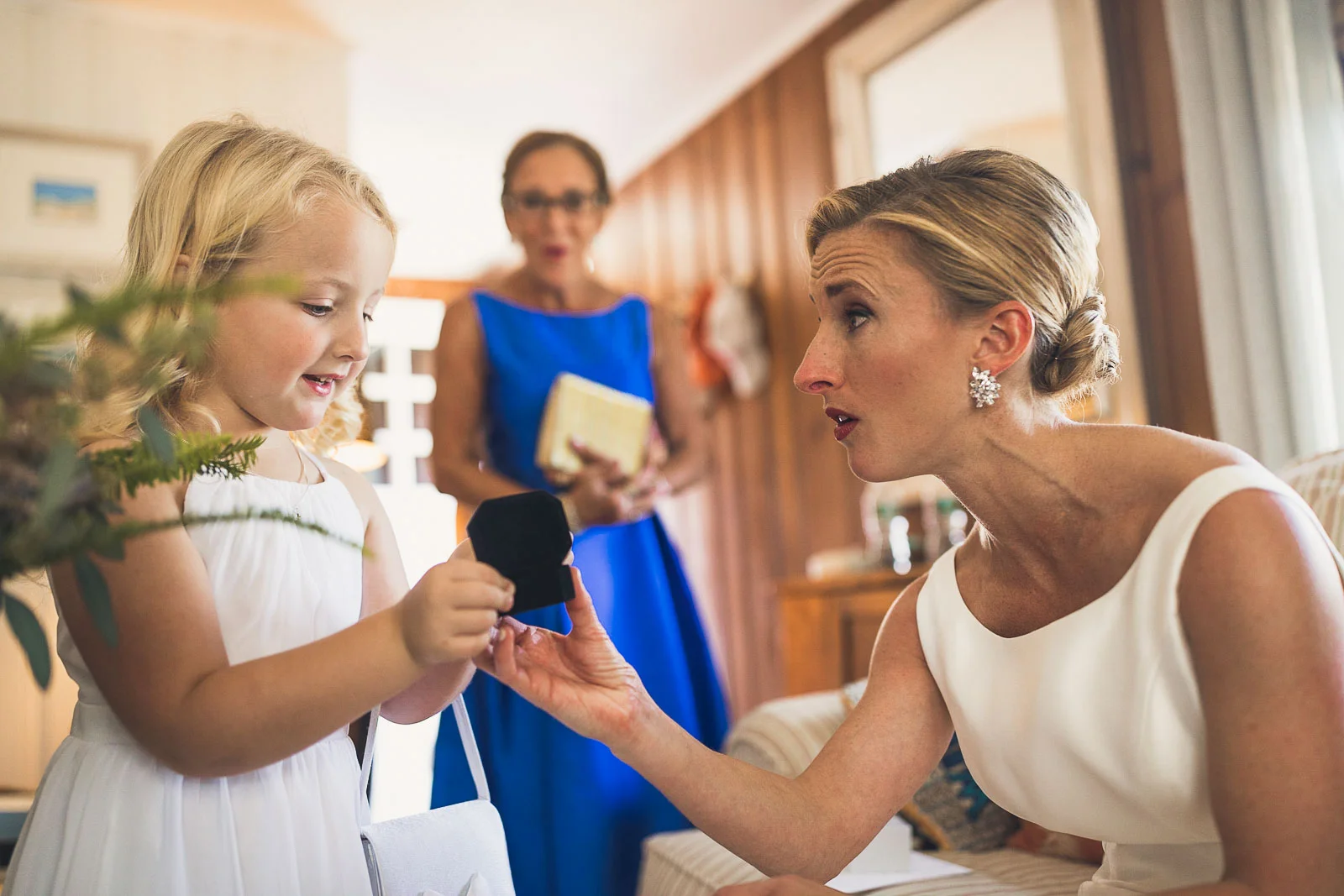 Flower girl looks at Jewelry