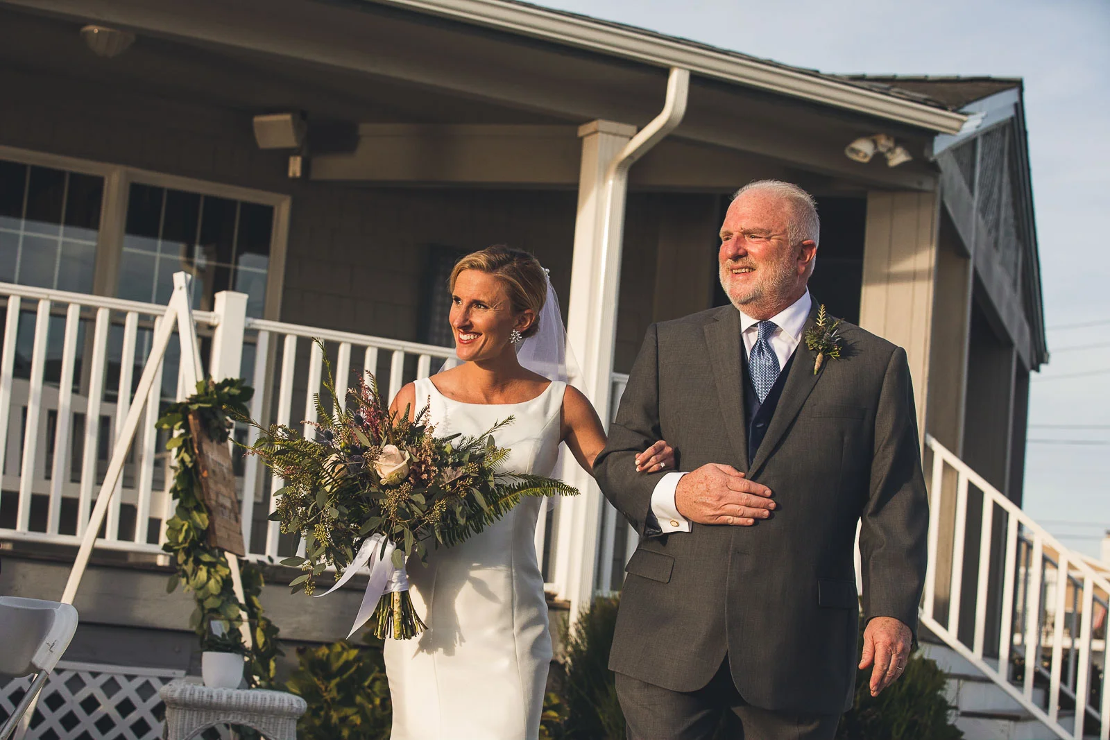 Bride and Father walk down aisle