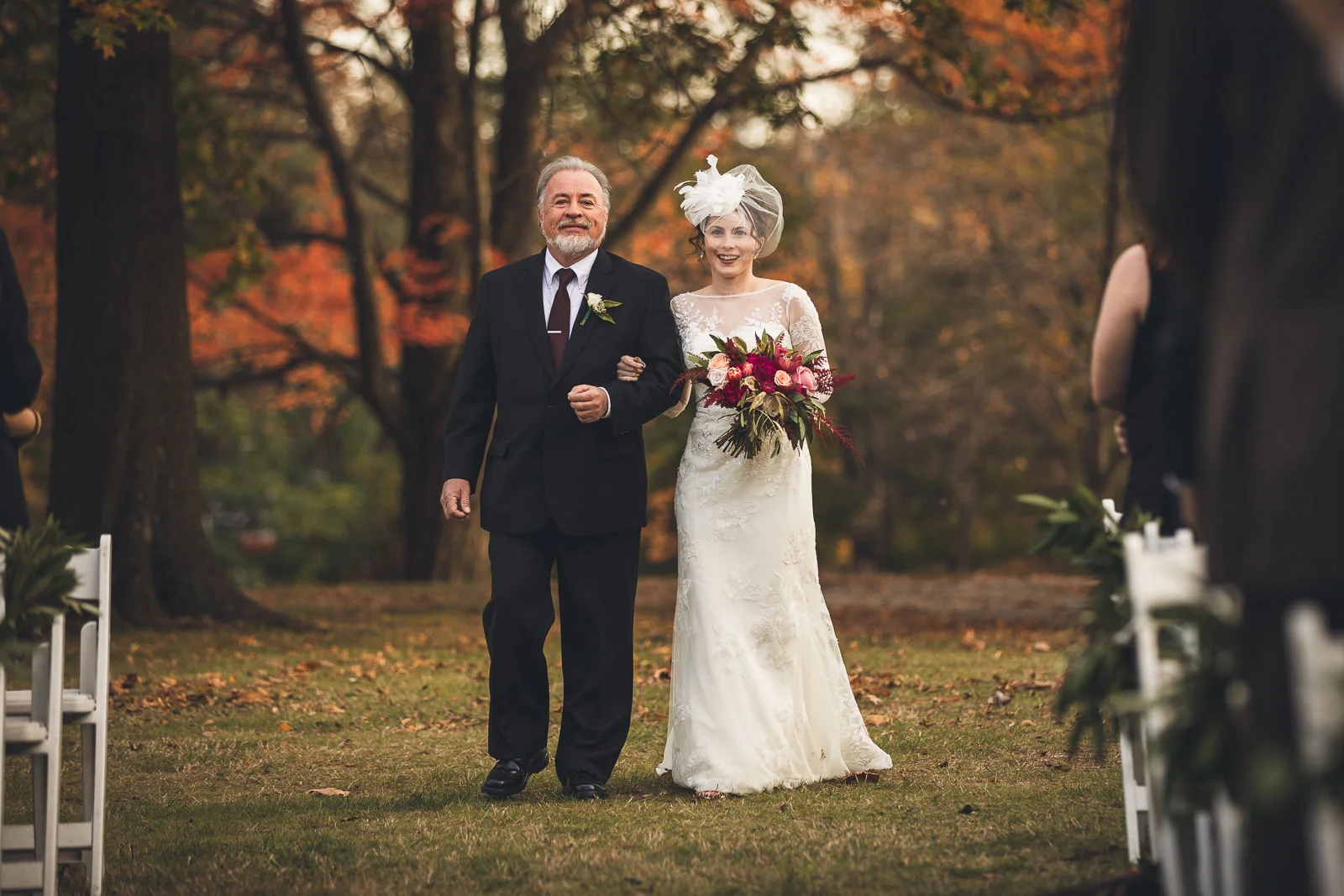 Father walks bride down aisle
