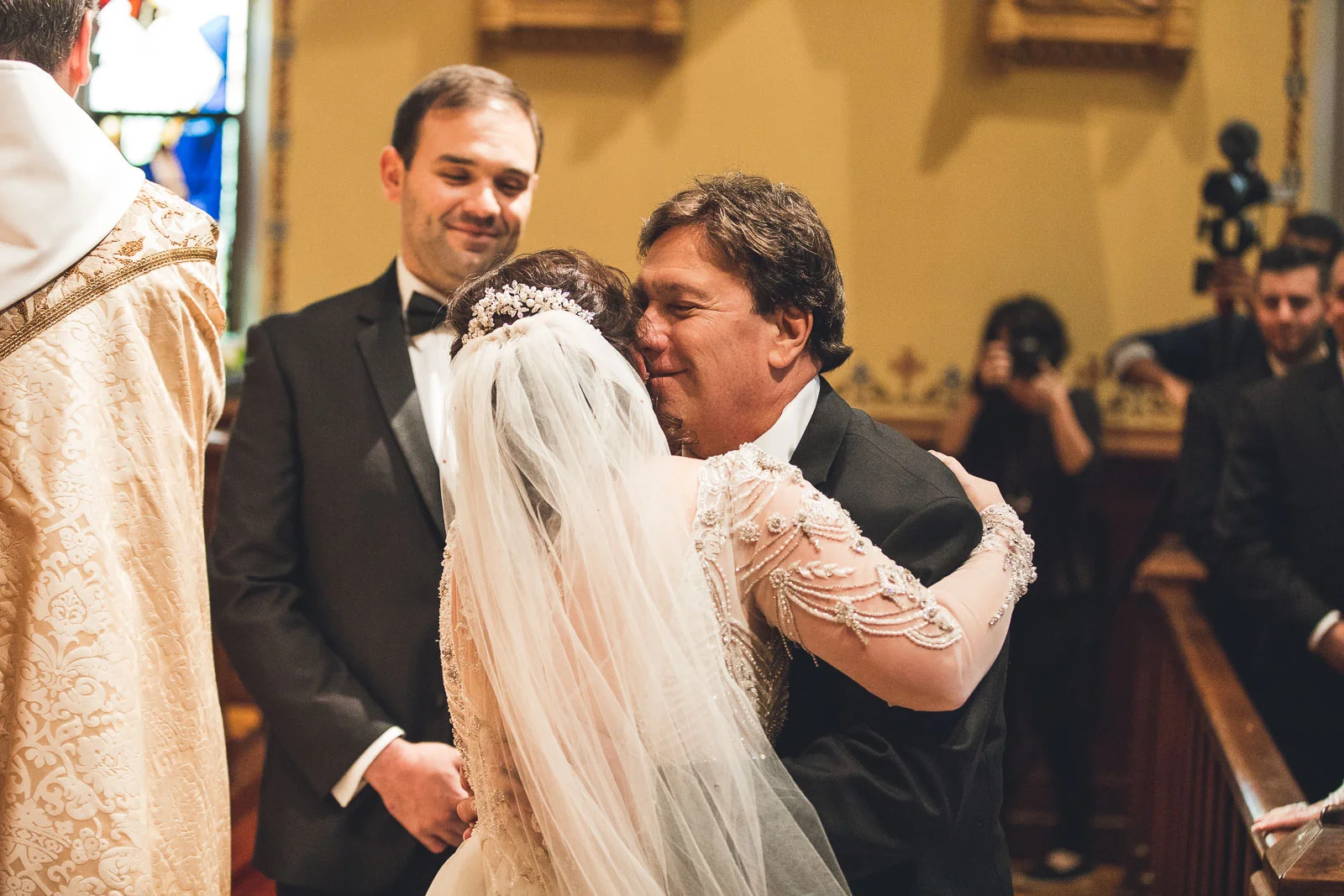 Bride and Father Embrace