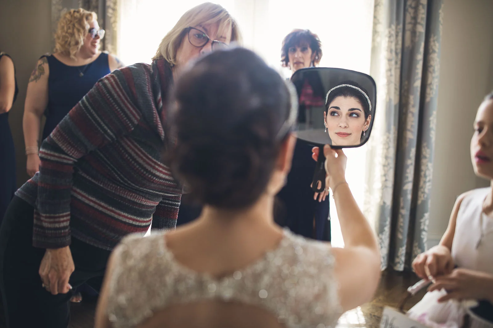 Bride checks hair