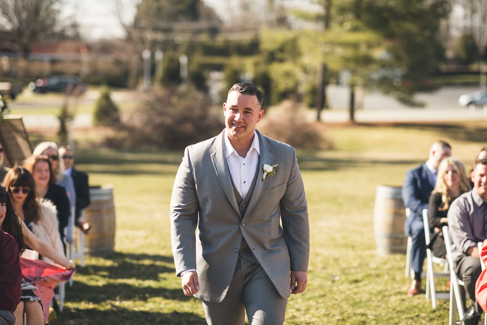 Groom Walks Down Aisle