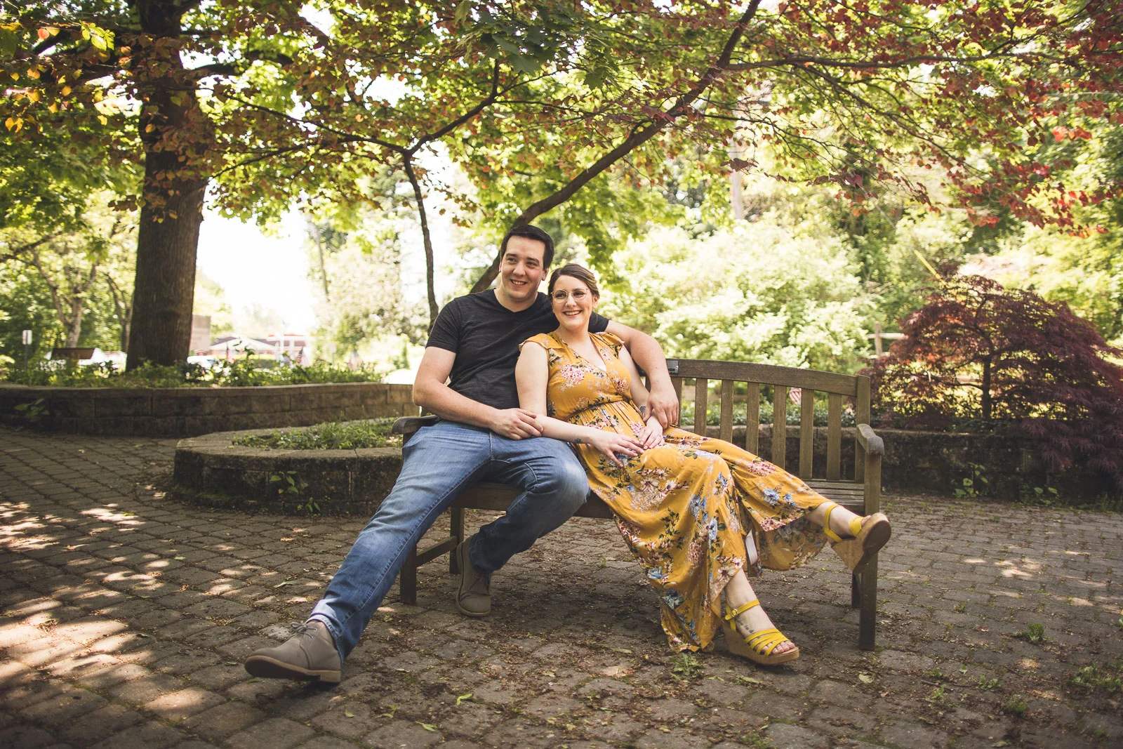 Couple relaxing on bench