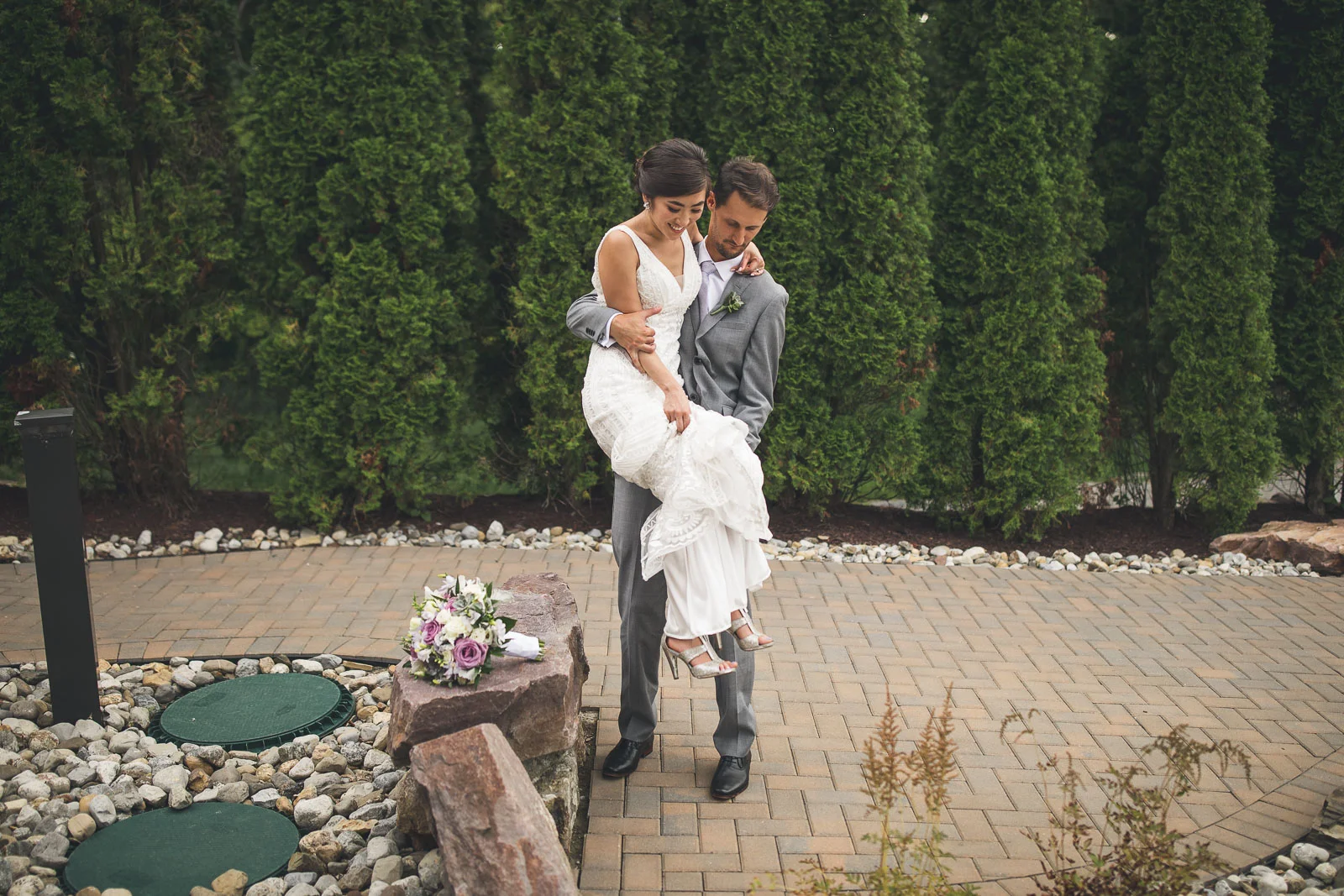 Groom helps Bride get down