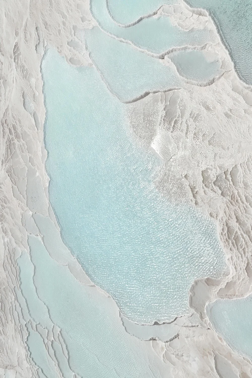 Photo of travertine pools in Turkey by Emre Koşak on Pexels