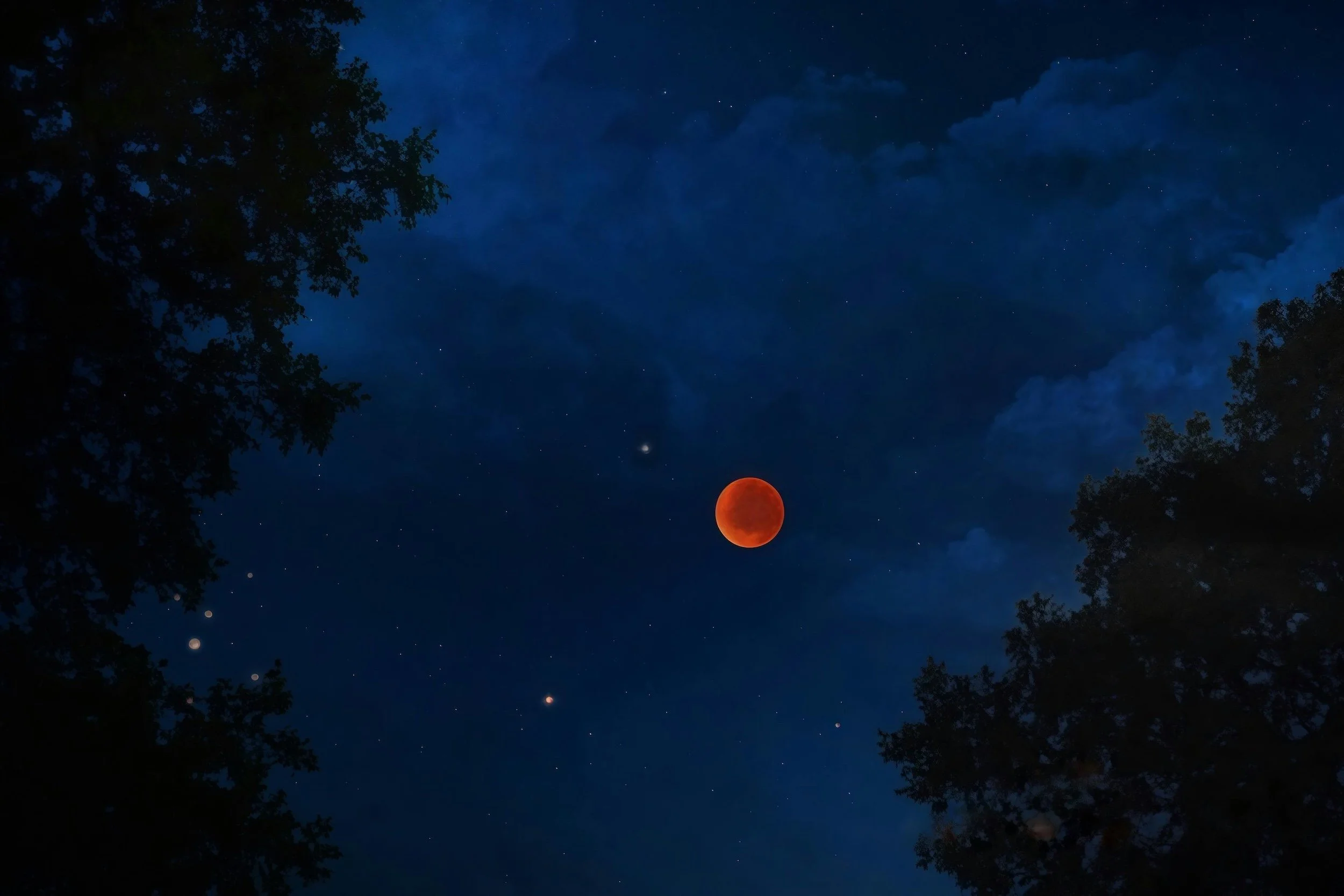 Red Moon in dark blue night sky by Nadun Vishwanath on Pexels