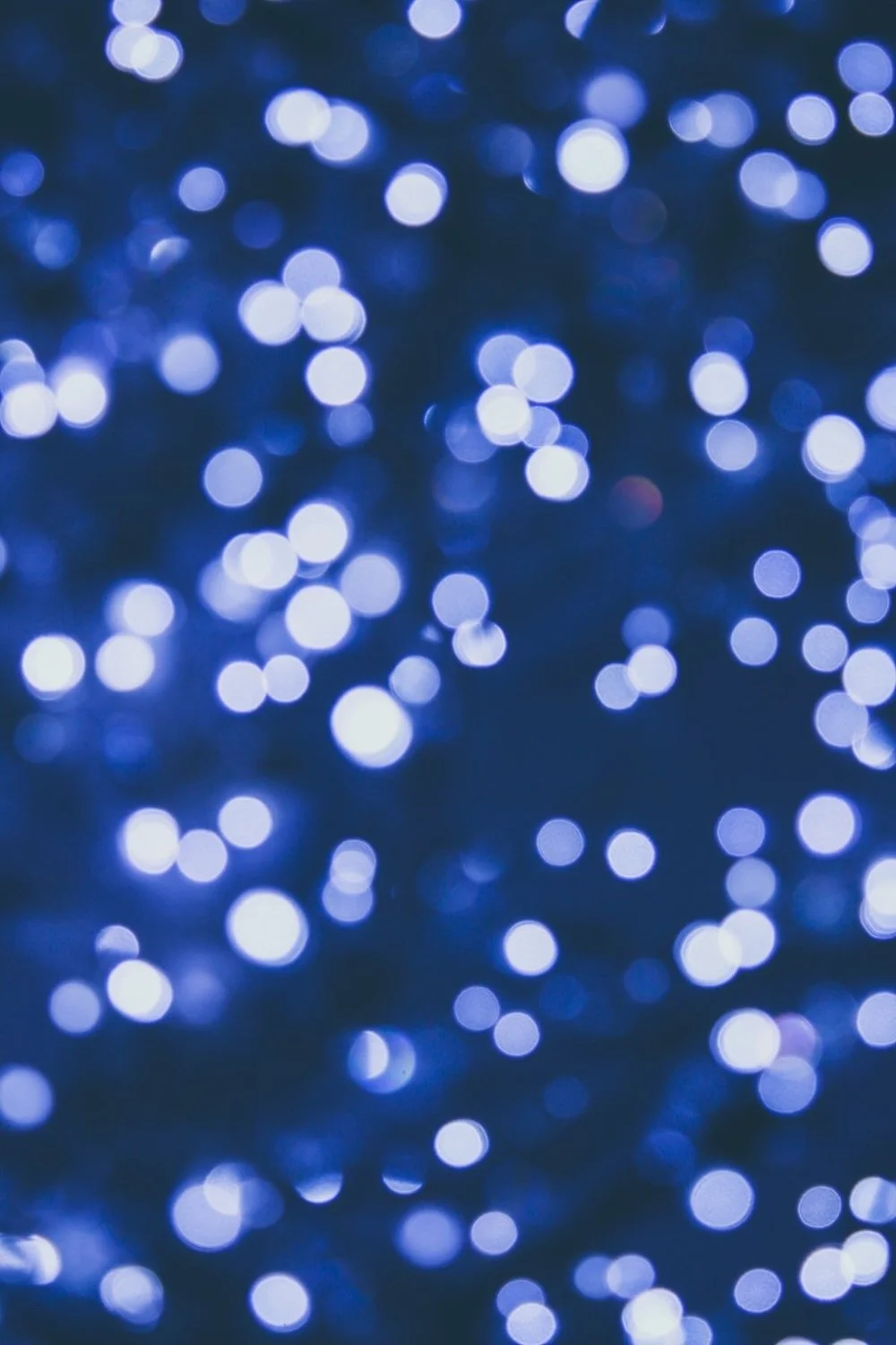 Photo of blue bokeh lights by Siora Photography on Unsplash