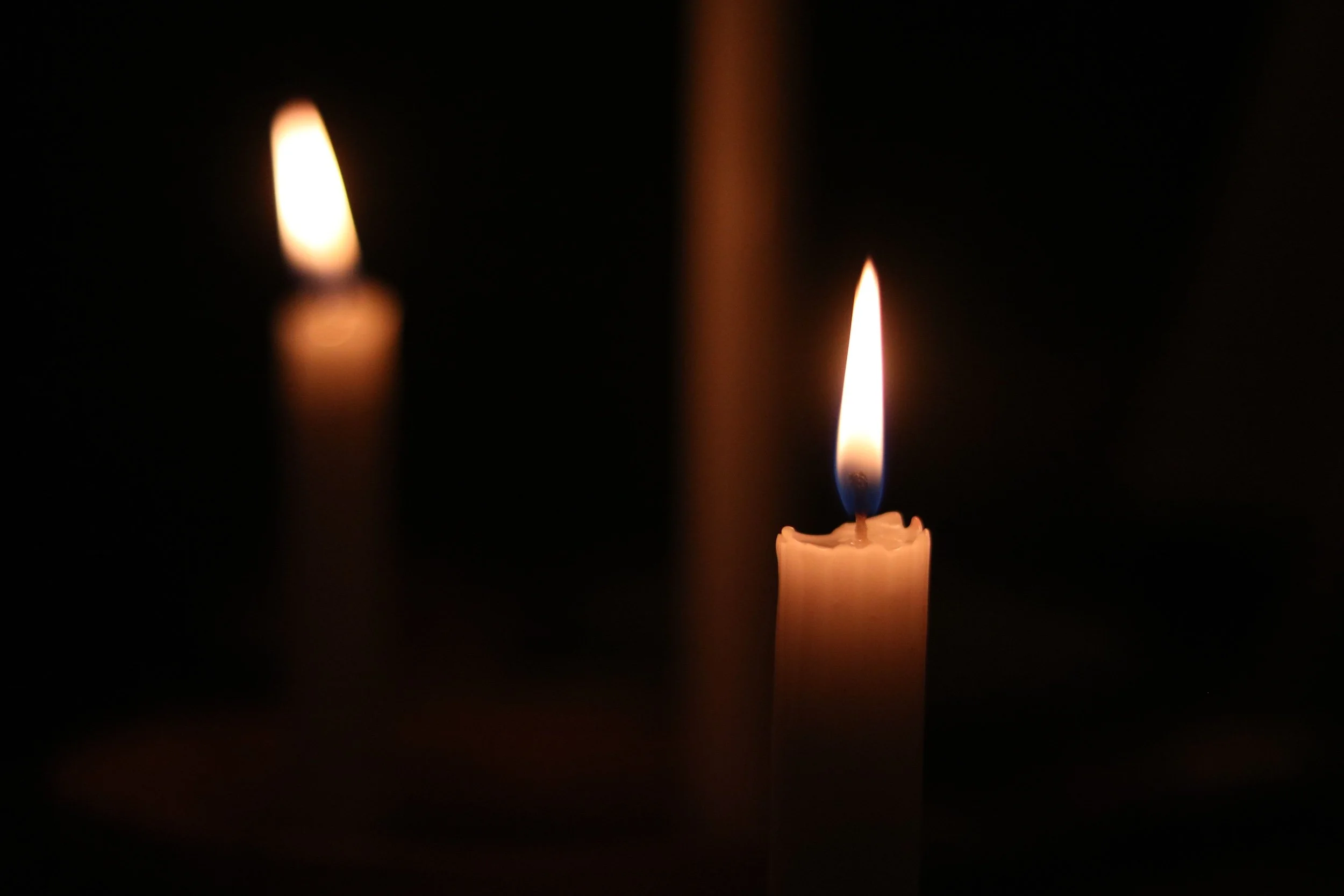 candle reflection in darkness